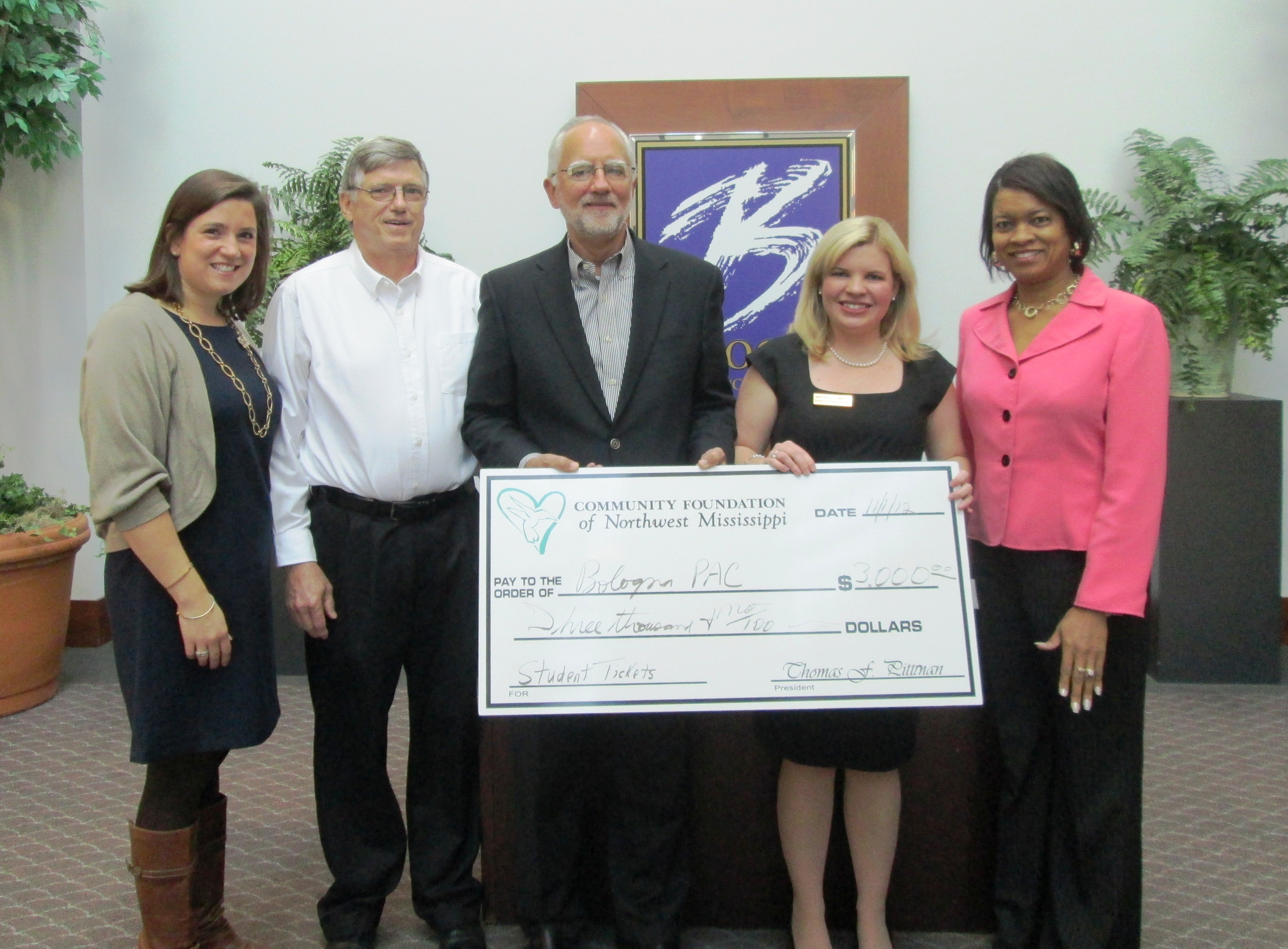 Photo: Laura Howell, BPAC Interim Executive Director, Whitney Cummins, BPAC Interim Arts Education Coordinator, and BPAC Arts Advisory Board Members Ron Koehler and Myra Boone accept the Place-Based Education Endowment from Tom Pittman, president of the Community Foundation of Northwest Mississippi.